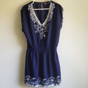 Navy blue dress with white floral details